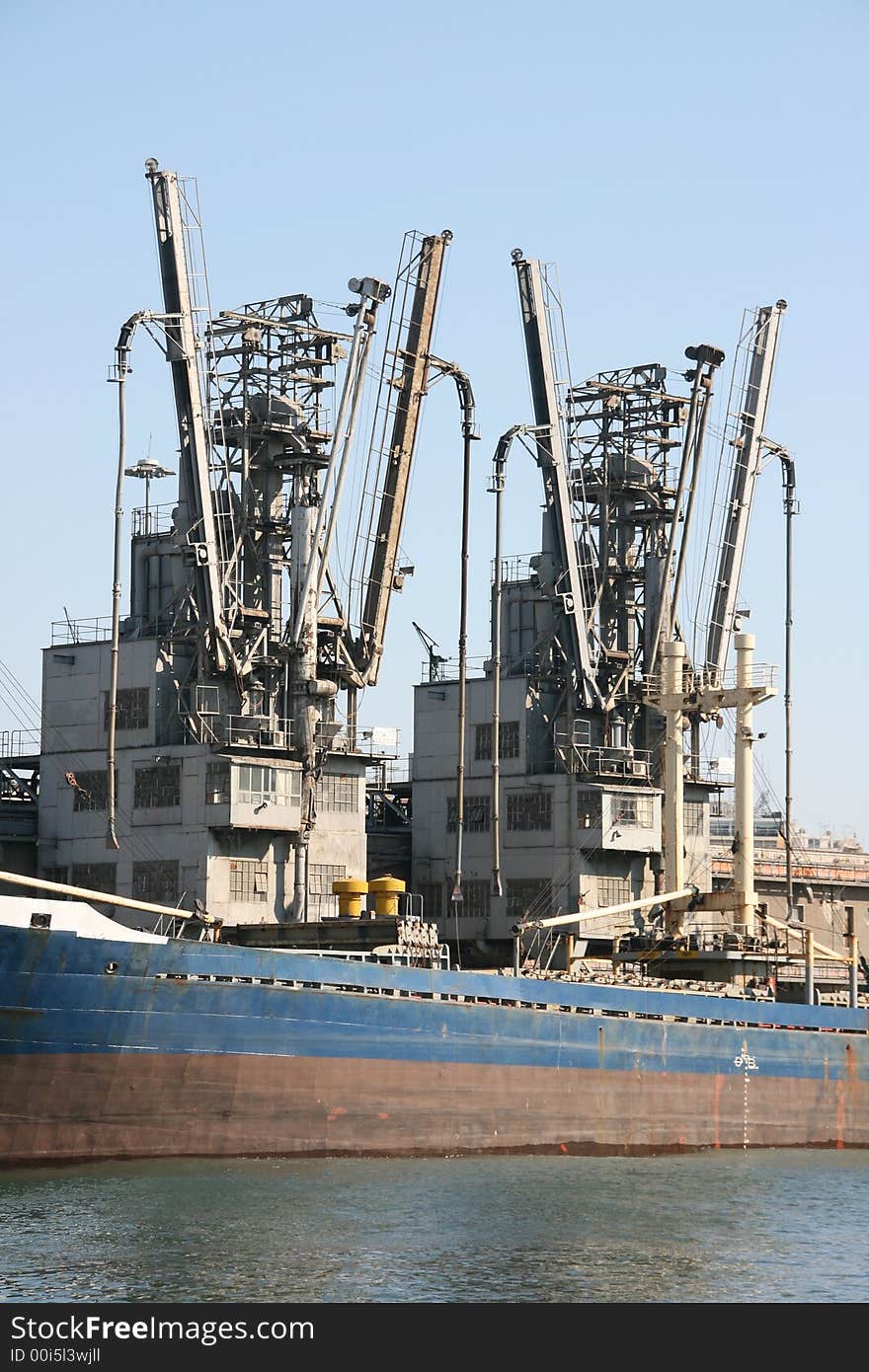 Ship loading equipment at the port of piraeus athens greece. Ship loading equipment at the port of piraeus athens greece