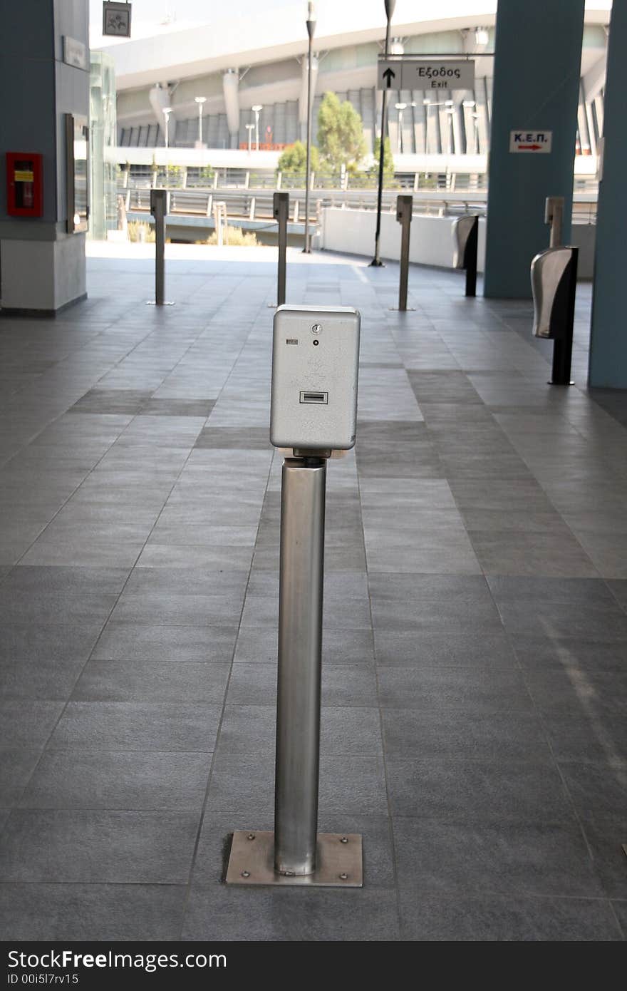 Ticket canceling machine at station