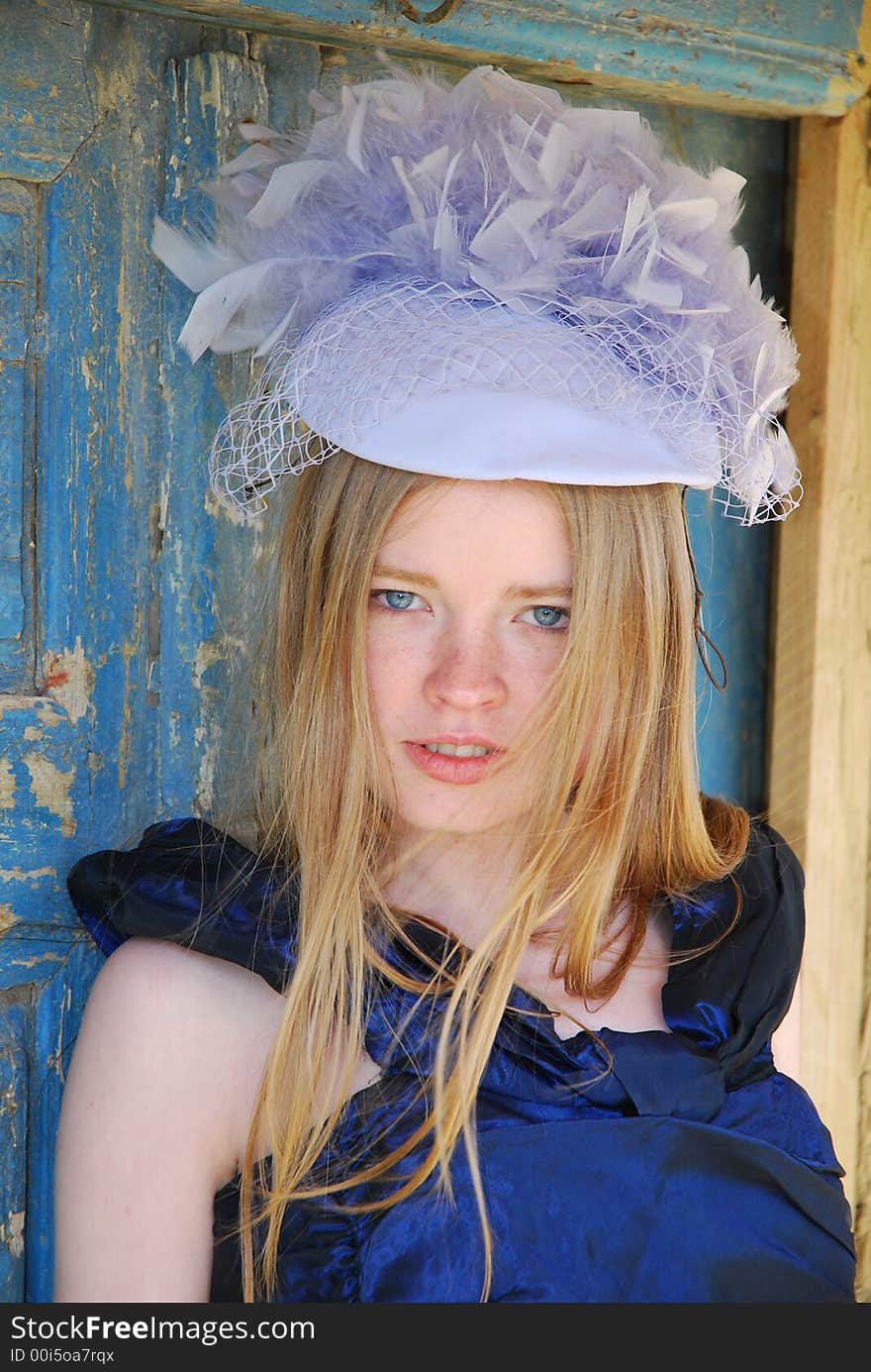 Blonde girl in retro hat