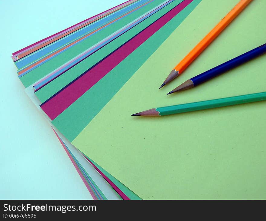 Colored paper and pencils for back to school. Colored paper and pencils for back to school