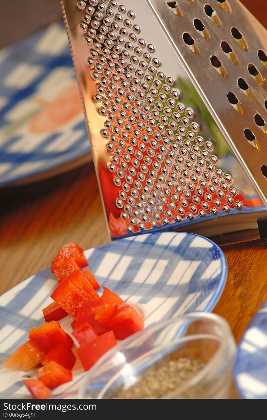 Food components for preparation of dish in plates on table