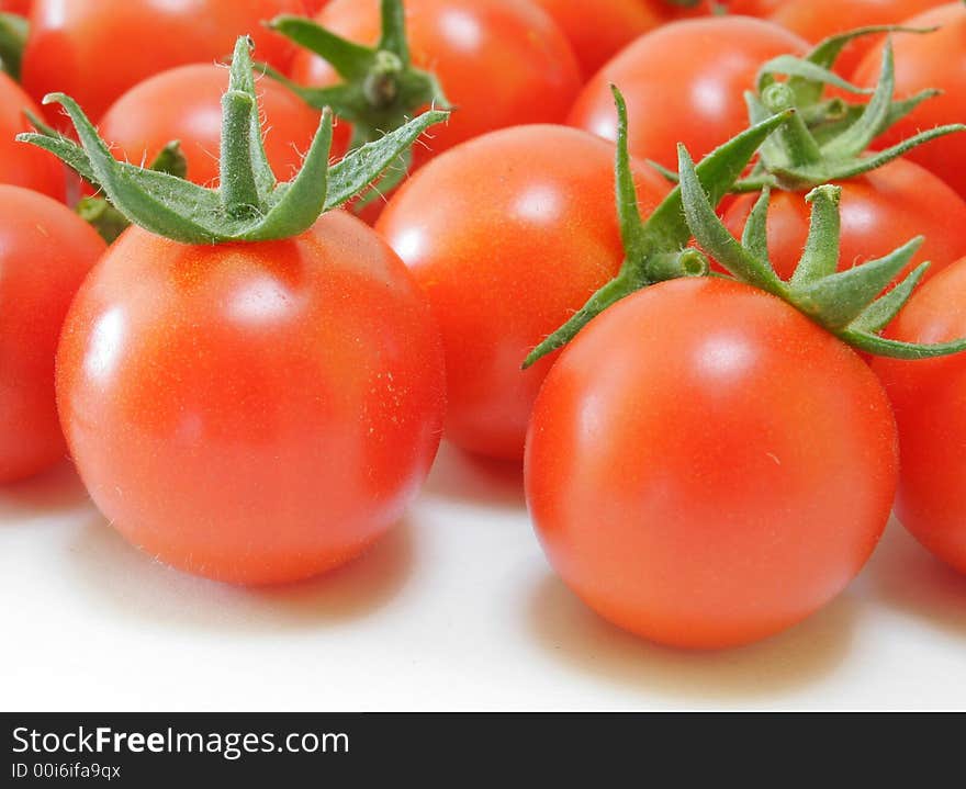 Fresh Organic Tomatoes on white. Fresh Organic Tomatoes on white