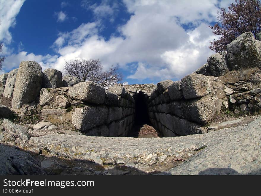 Acient ruins symbol of past under blue cloudly sky. Acient ruins symbol of past under blue cloudly sky