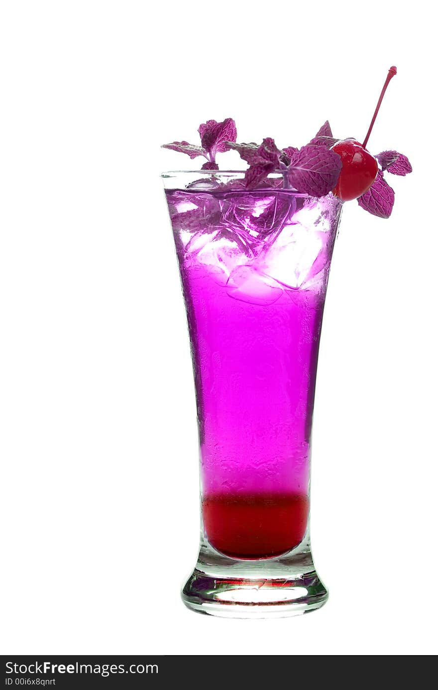 Colorful alcoholic cocktail in a tall glass against white background. Colorful alcoholic cocktail in a tall glass against white background