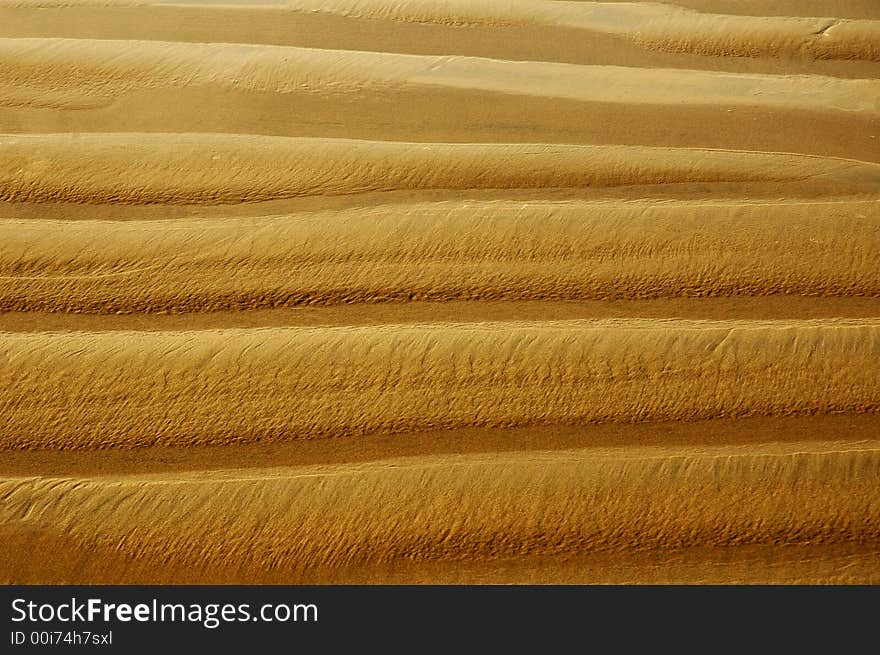 Sand stirations forming an an abstract arteffect. Sand stirations forming an an abstract arteffect