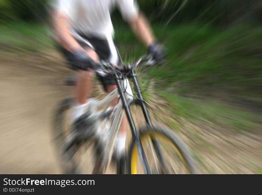 Mountain biker and zooming effect. Mountain biker and zooming effect