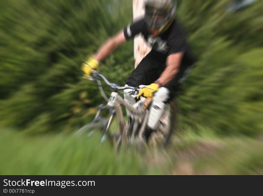 Mountain biker with zooming effect. Mountain biker with zooming effect