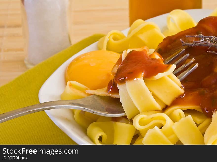 Italian food pasta with tomato sauce on white bowl. Italian food pasta with tomato sauce on white bowl