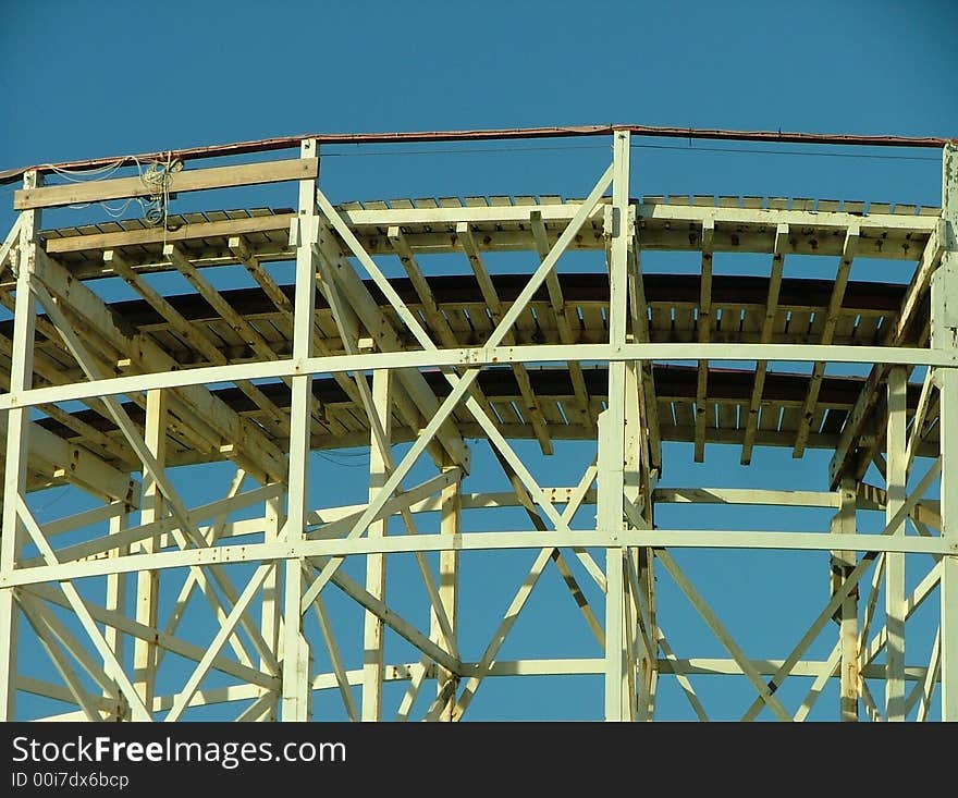 An old wooden rollercoaster by the seaside. An old wooden rollercoaster by the seaside