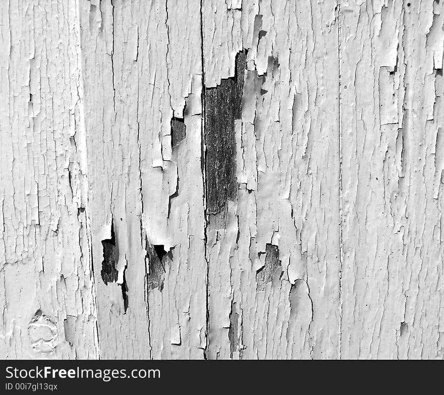 An image of some painted wood that is cracked,it would make an interesting texture background. An image of some painted wood that is cracked,it would make an interesting texture background.