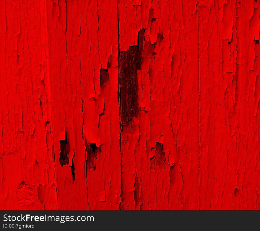 An image of some painted wood that is cracked,it would make an interesting texture background. An image of some painted wood that is cracked,it would make an interesting texture background.