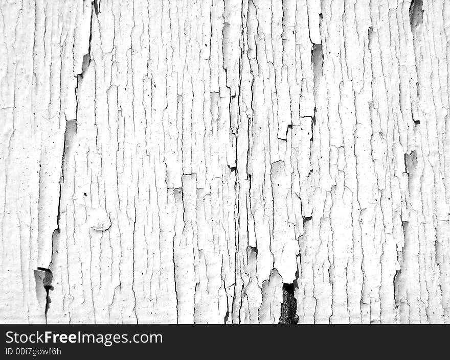 An image of some painted wood that is cracked,it would make an interesting texture background. An image of some painted wood that is cracked,it would make an interesting texture background.