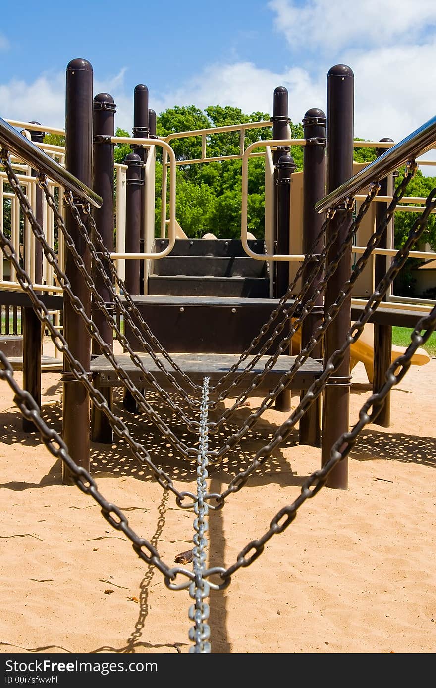 Playground chain bridge connecting two sides for children to cross