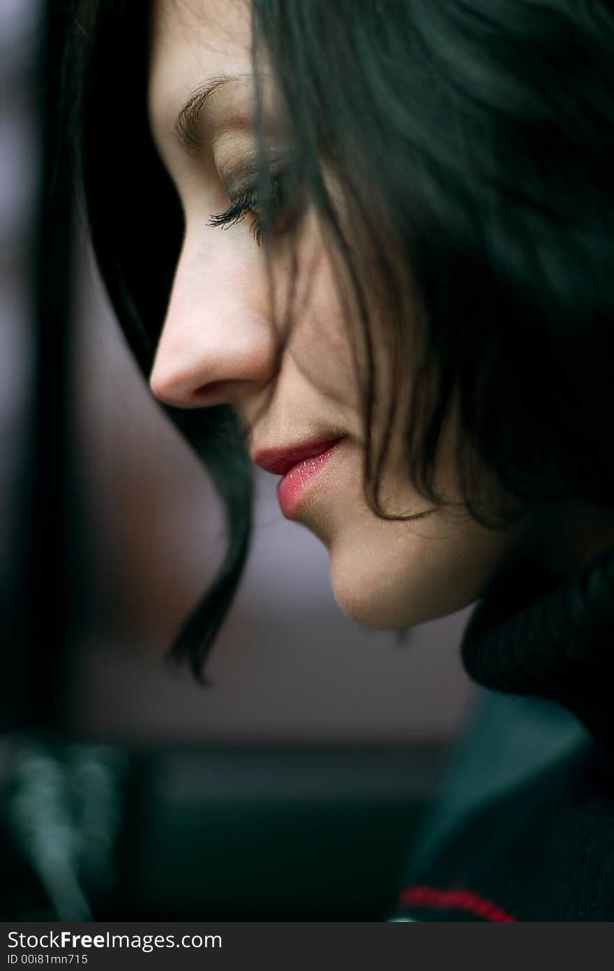 Portrait of beautiful woman, soft-focused, focus is on lips and eyelashes