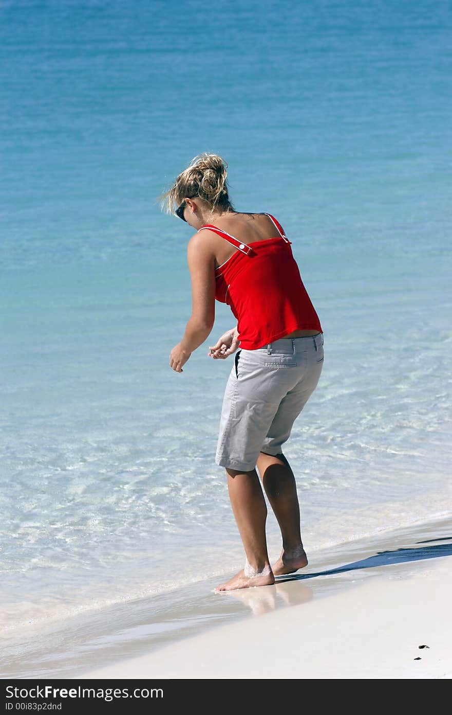 Girl at Whitehaven beach in the Whitsundays area. Girl at Whitehaven beach in the Whitsundays area