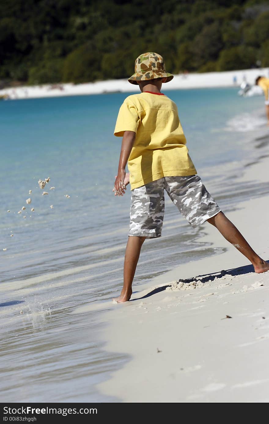 Boy at Whitehaven beach