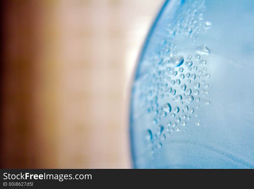 Close-up of bottle with water droplets.