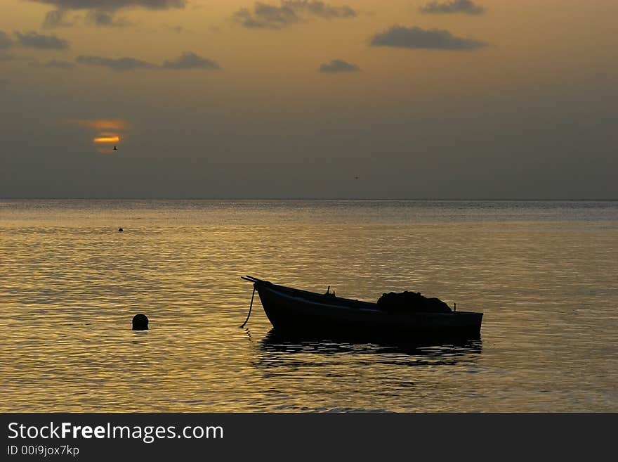 Fisherboat at sunset