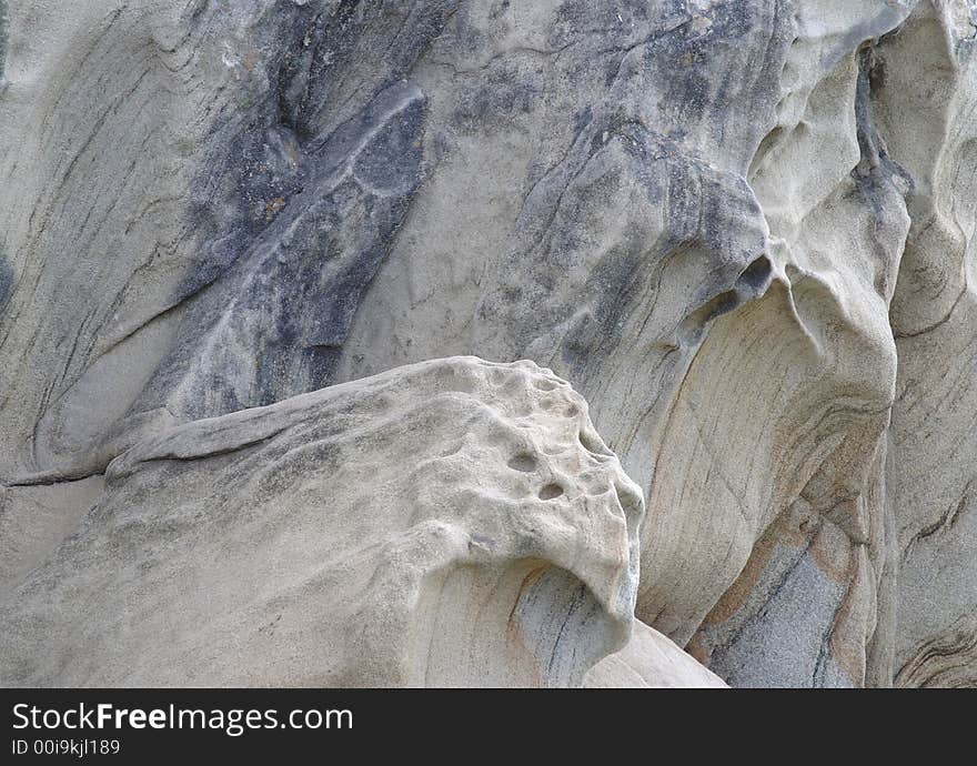 Sandstone that is well worn by water. Sandstone that is well worn by water