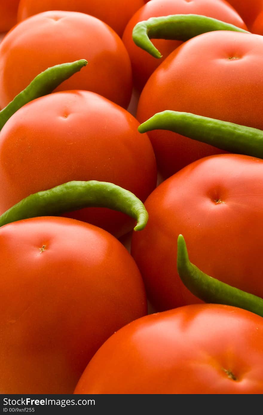 Red tomatoes and green peppers, good for background. Red tomatoes and green peppers, good for background