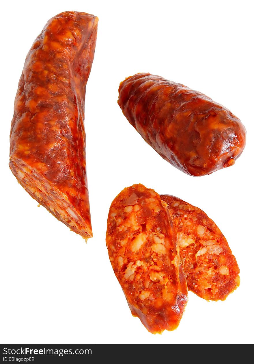 Cuted spicy home-made sausage isolated on white background