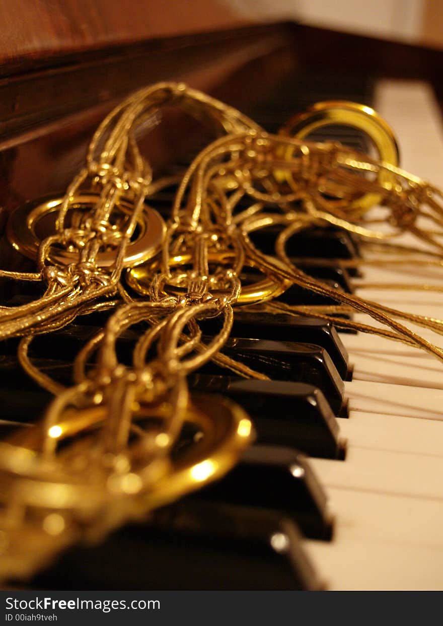 Upright piano with gold filaments