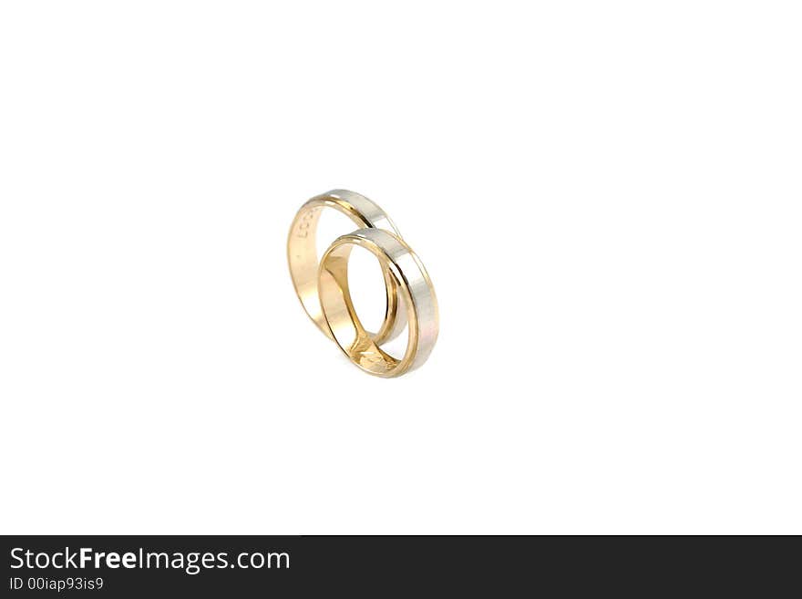 Wedding rings on white background