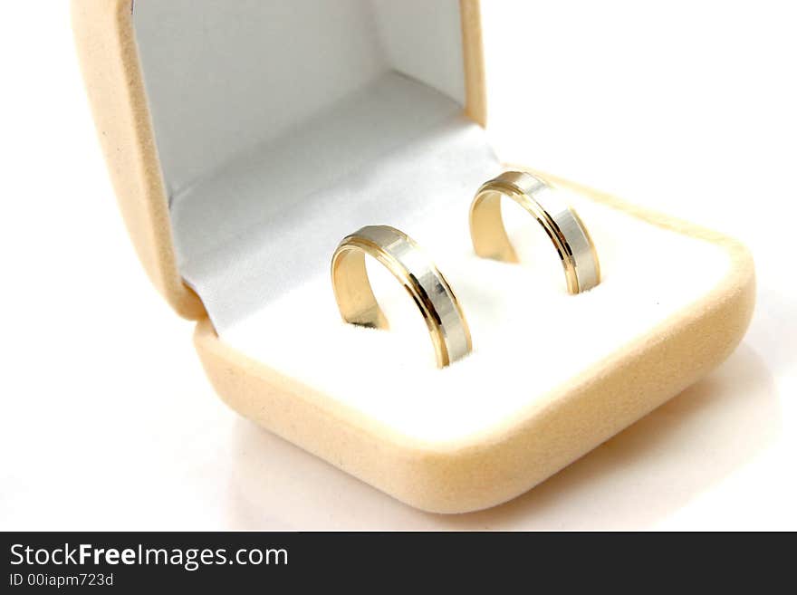 Wedding rings on white background