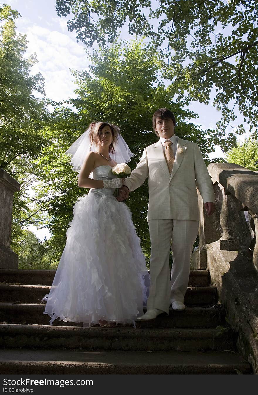 Bride and groom in the park