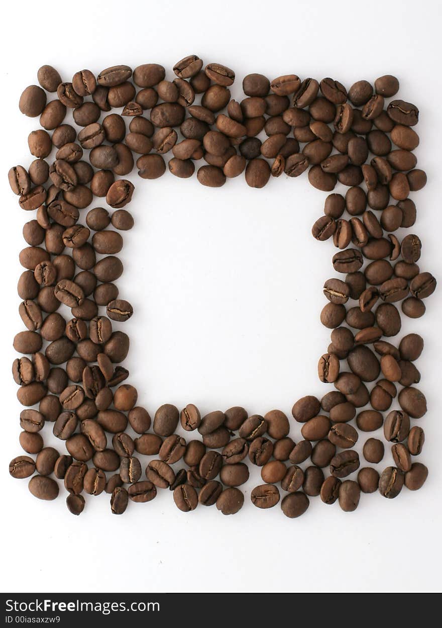 Coffee beans arranged in a frame. Coffee beans arranged in a frame