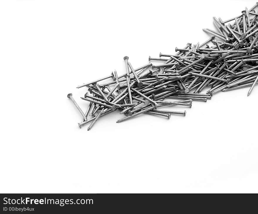 Pile of nails on white background