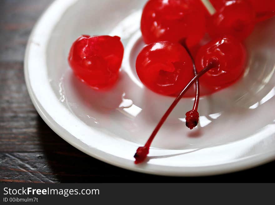 Berries of a cherry lay in a glass with shampane. Berries of a cherry lay in a glass with shampane