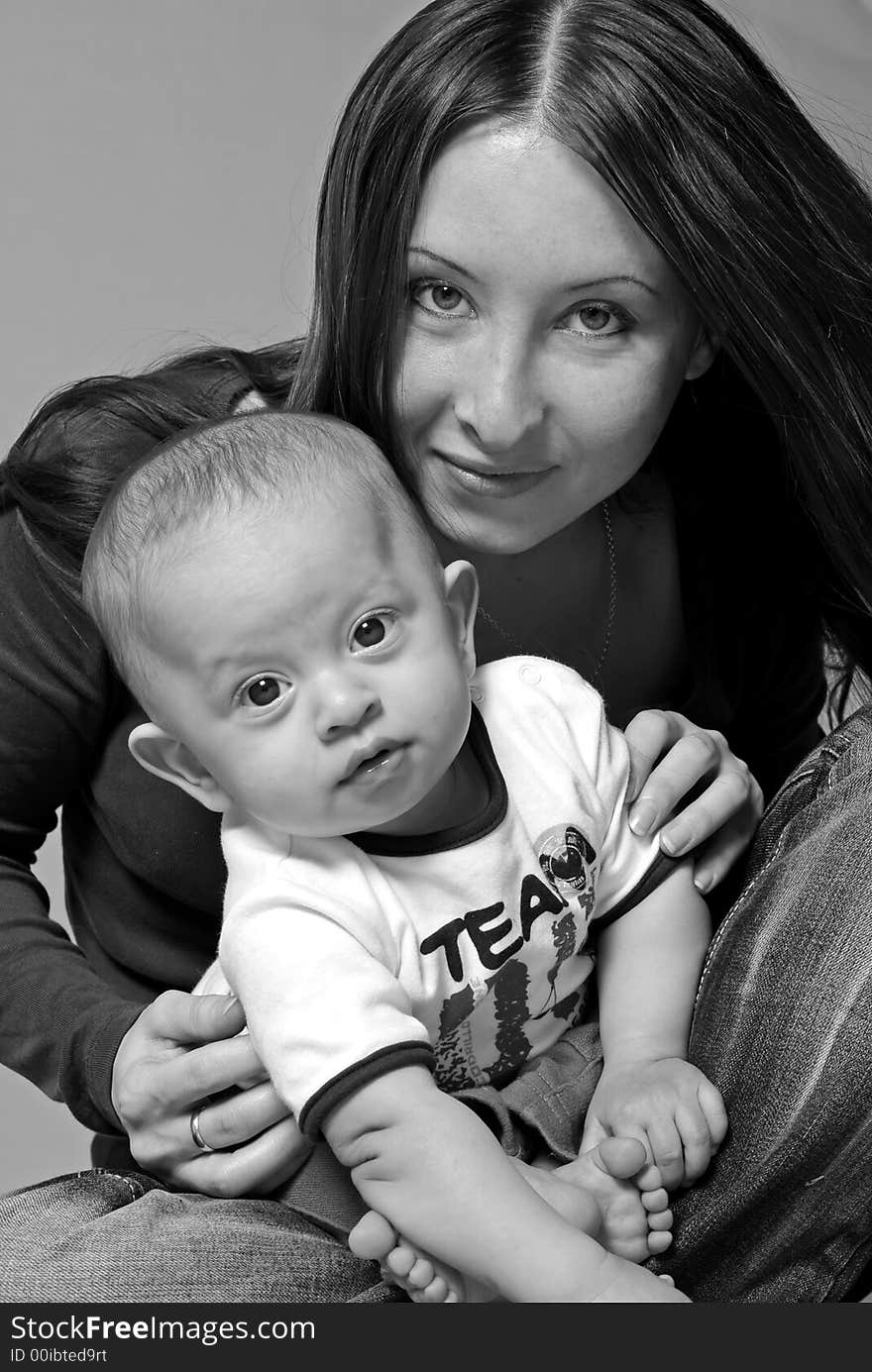 Mother With A Child In Her Lap