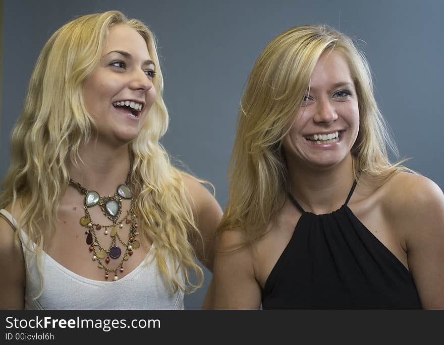 Two Sisters having fun and laughing together. Two Sisters having fun and laughing together