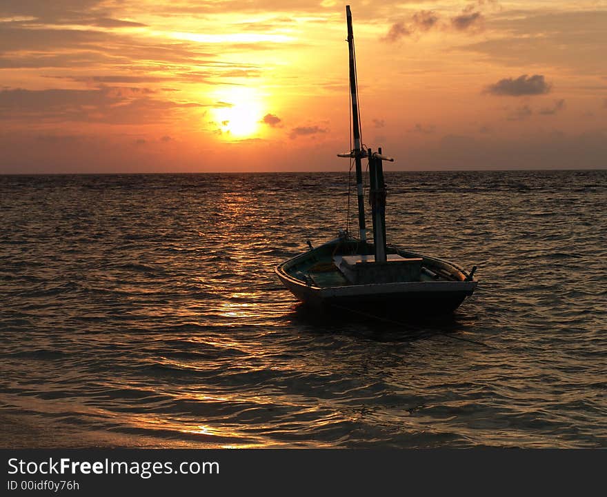 a sunset view from Eydhafushi island of Madlives. a sunset view from Eydhafushi island of Madlives