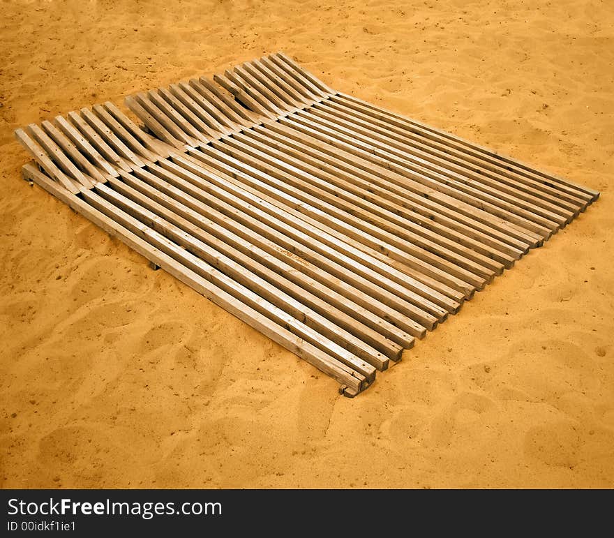 Chaise longue on sand