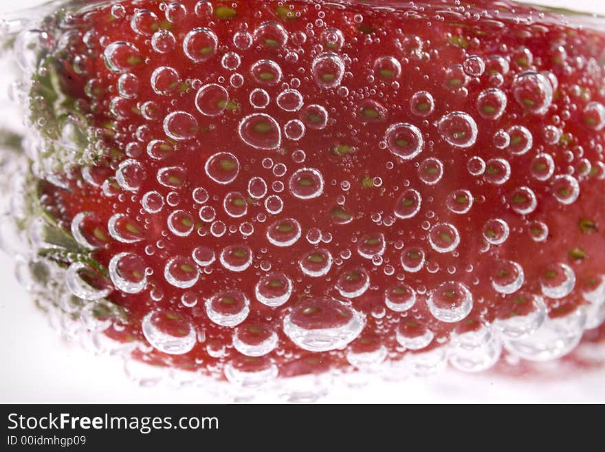 Red strawberry fruit and bubble water drink