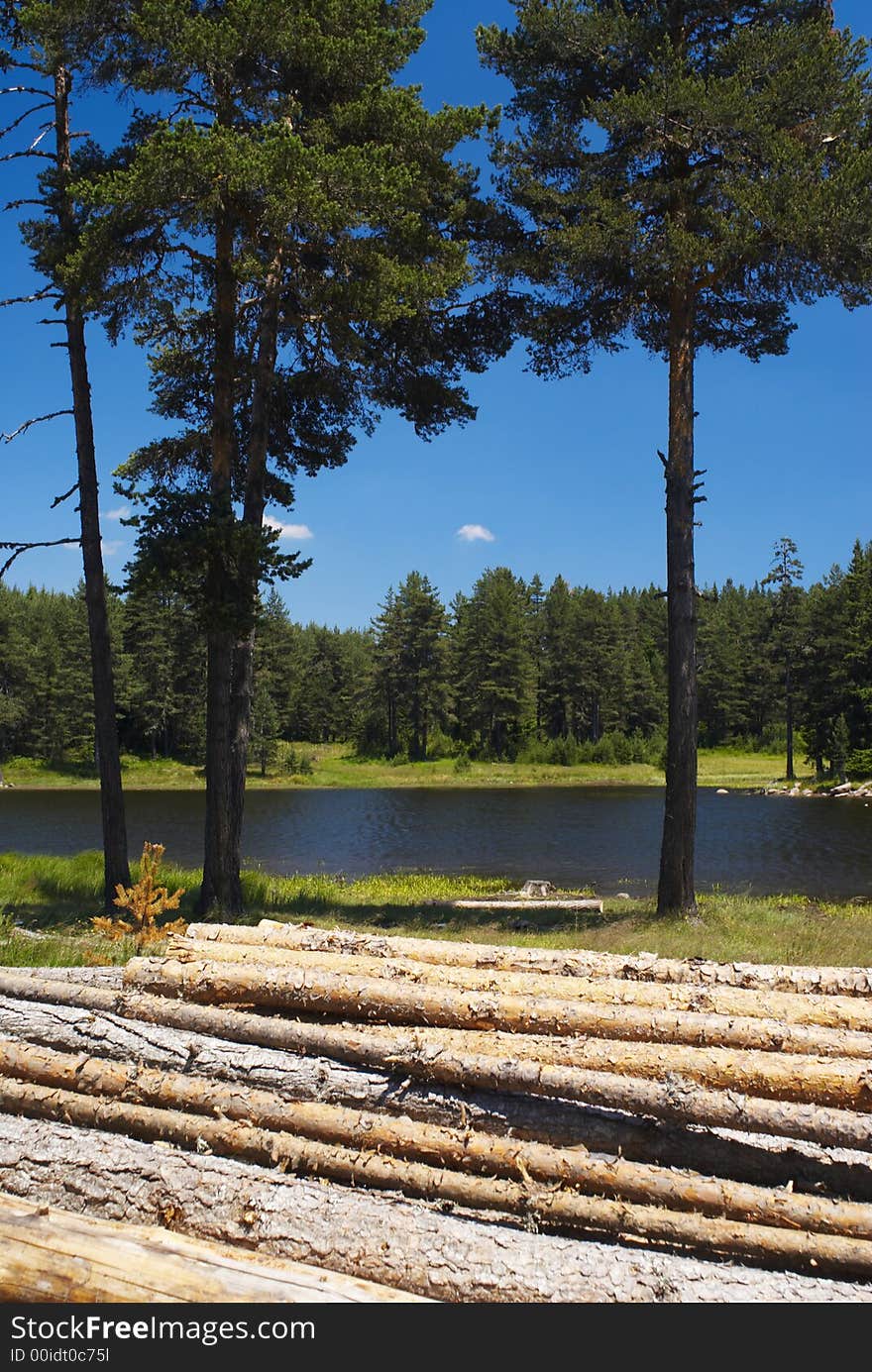 Summer mountain panorama with blue sky and lake. Summer mountain panorama with blue sky and lake