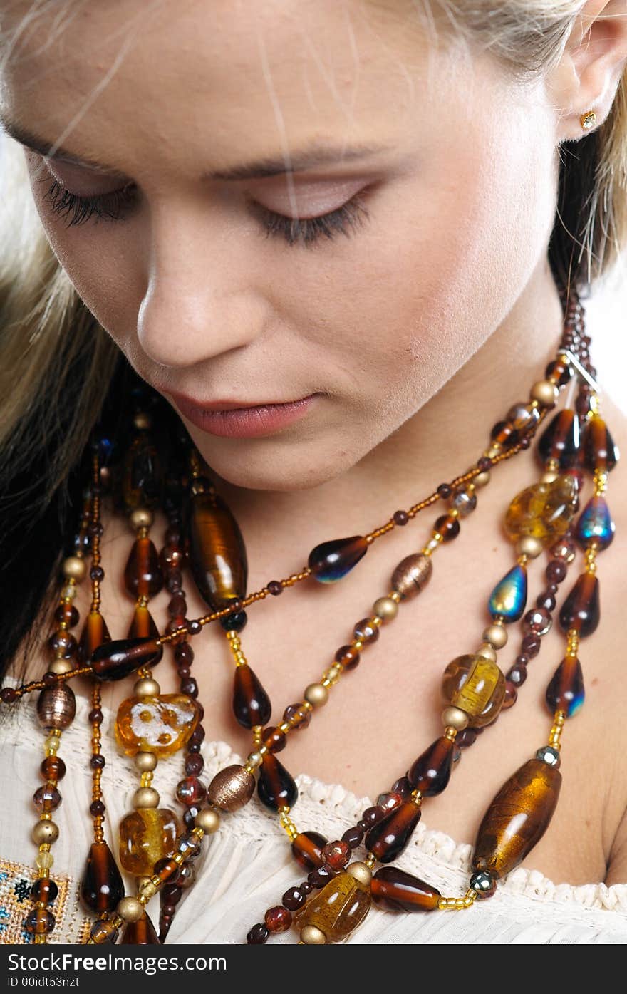 Portrait of woman with beads