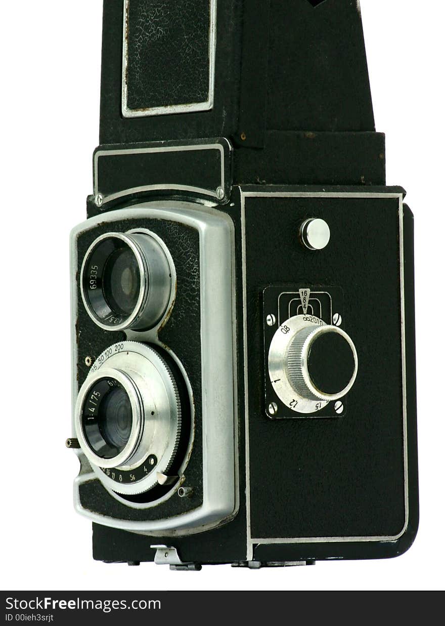 View at old manual photo camera on a white background. View at old manual photo camera on a white background