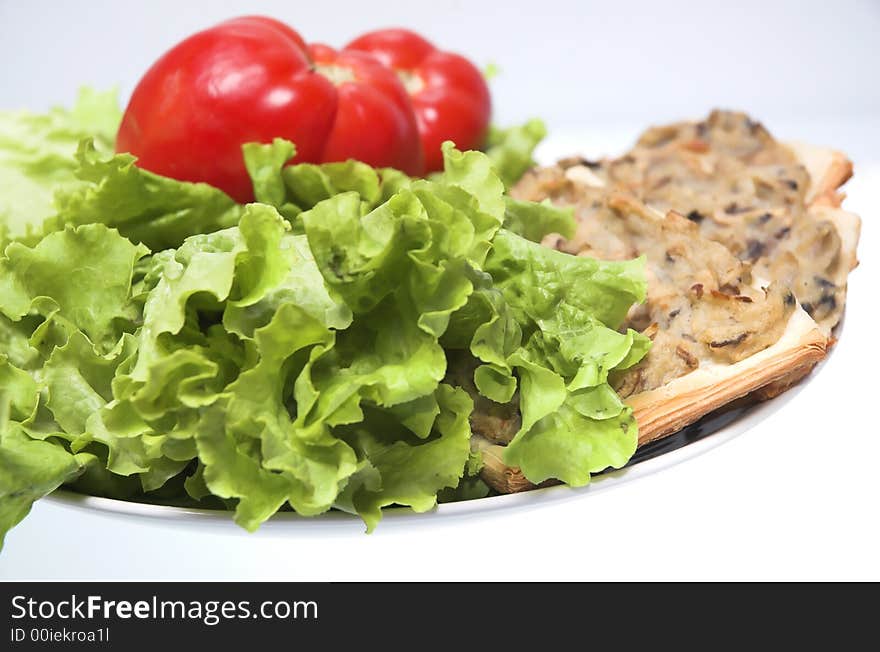 Sandwiches with salad and tomatoes