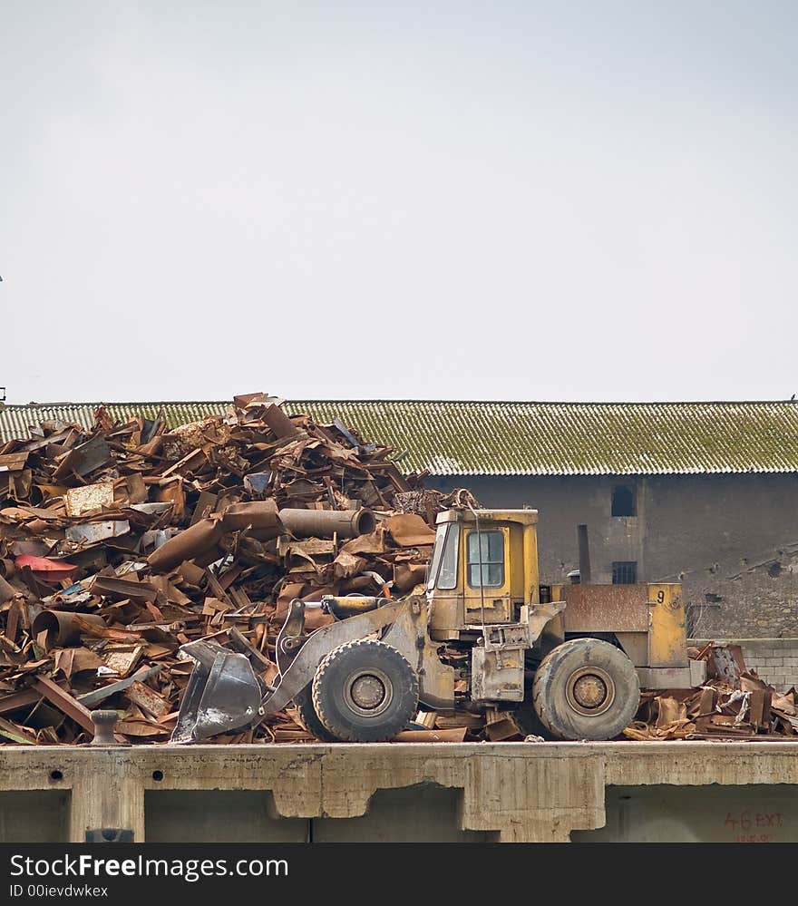 The heavy building bulldozer of yellow color