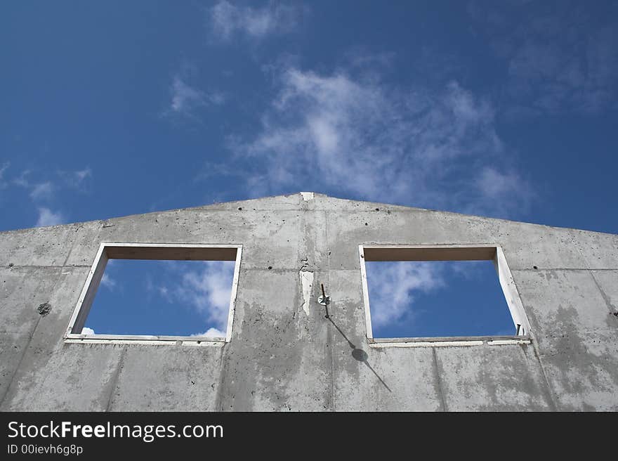 Unfinished House And Blue Sky