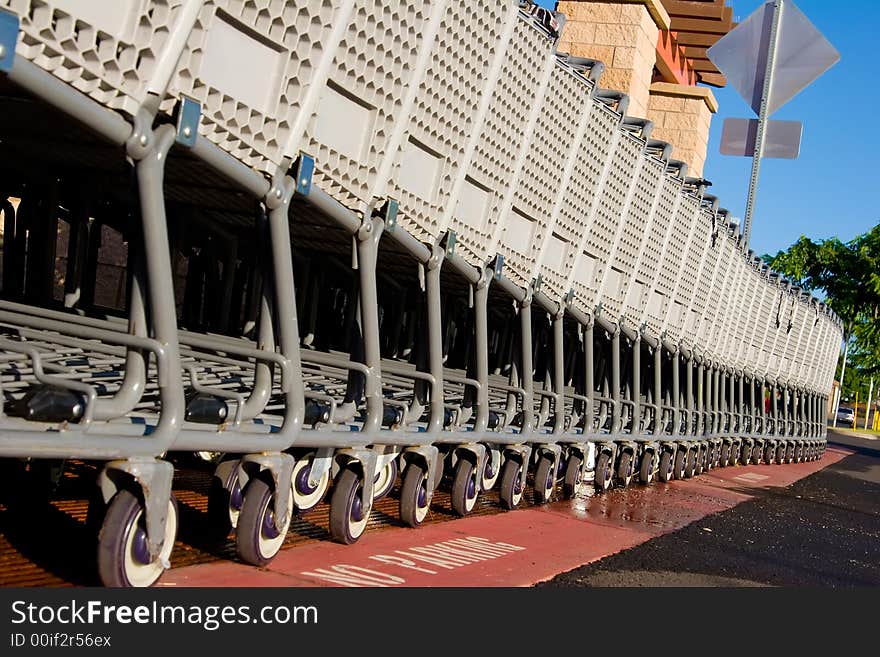 Supermarket shopping carts outside waiting to be used