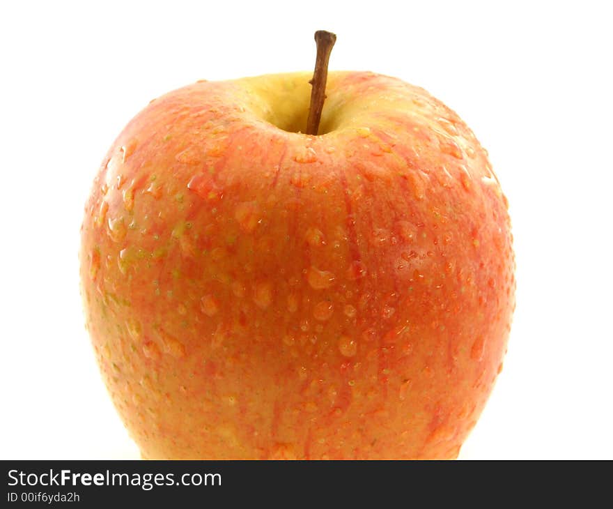 Shiny wet piece of apple on white background