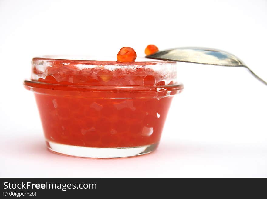 Red caviar in bank. It is isolated