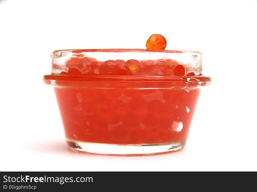 Red caviar in bank. It is isolated