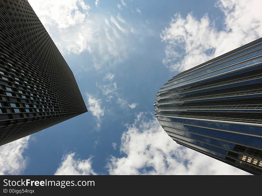 Reflective Glass Building located in Boston's Back Bay area shown with it's neighbor. Reflective Glass Building located in Boston's Back Bay area shown with it's neighbor