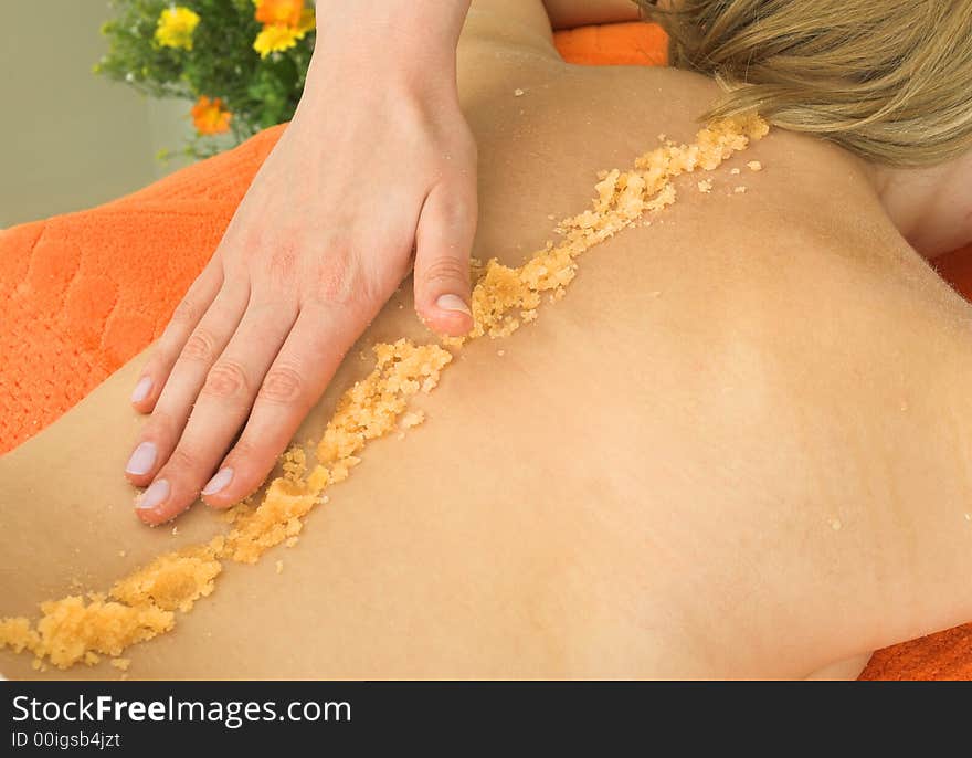 Picture of a lady relaxing in massage salon. Picture of a lady relaxing in massage salon