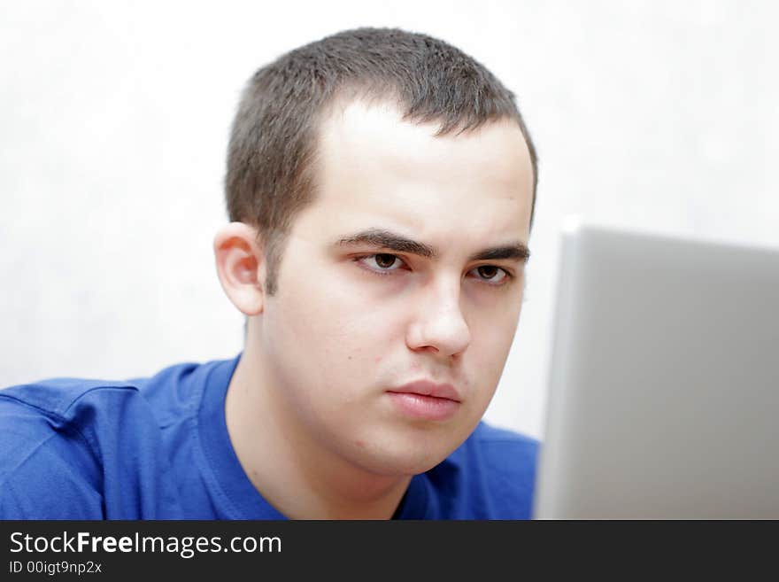 Student working on his laptop